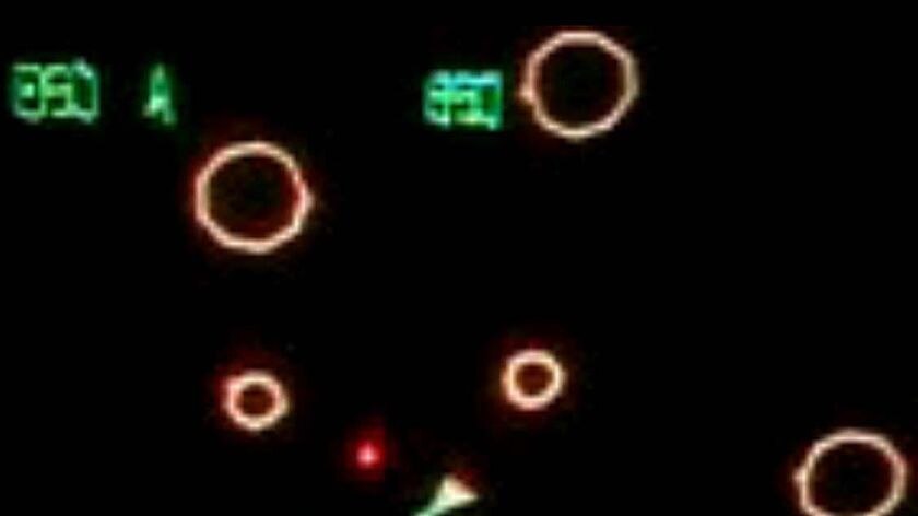 A screen shot of Atari video game Asteroids. Universal Pictures has won a four studio bidding war to pick up the film rights for the arcade game.