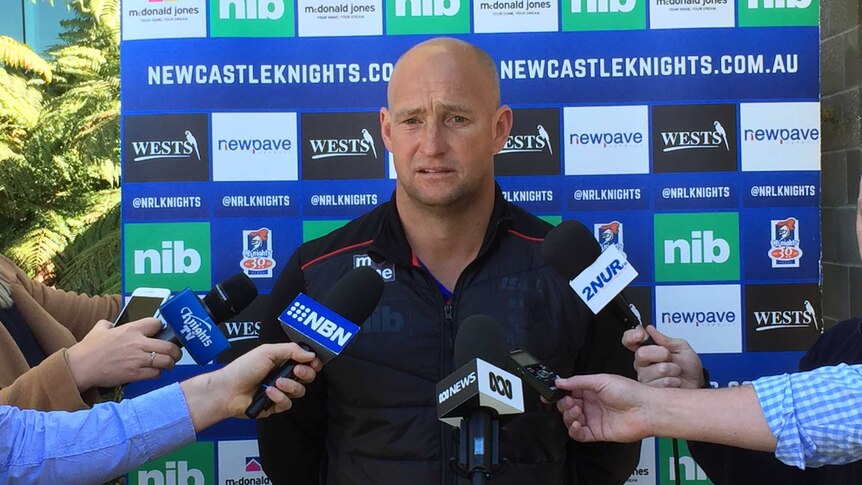 Newcastle Knights coach Nathan Brown speaking at a press conference.