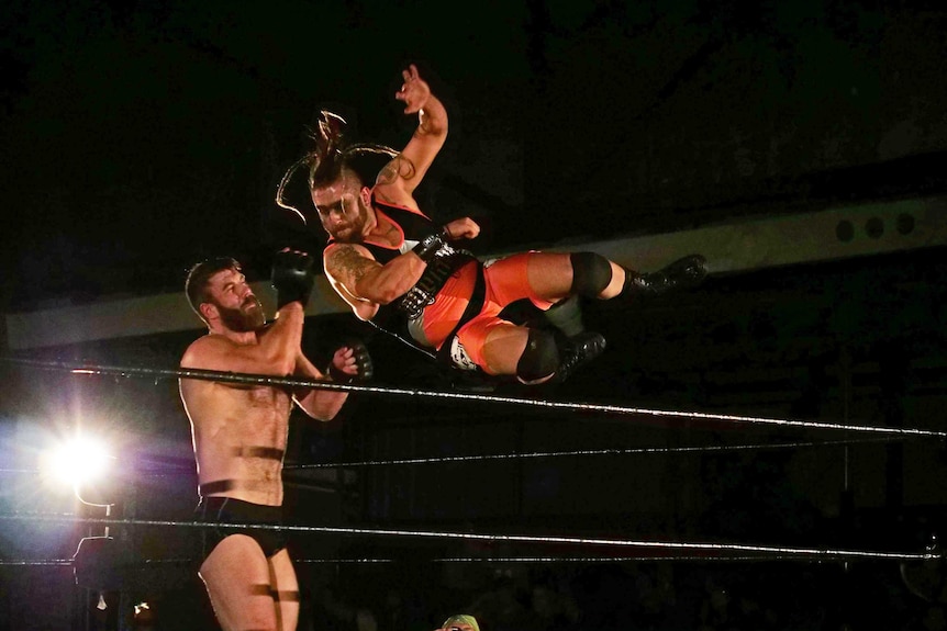 Axxton leaps on a competitor