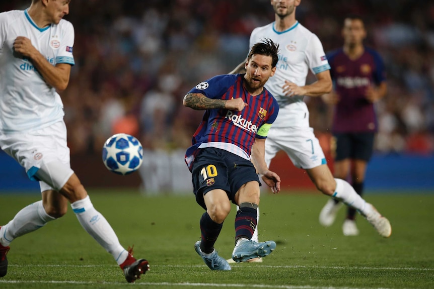 Barcelona's Lionel Messi shoots against PSV Eindhoven in Champions League on September 18, 2018.