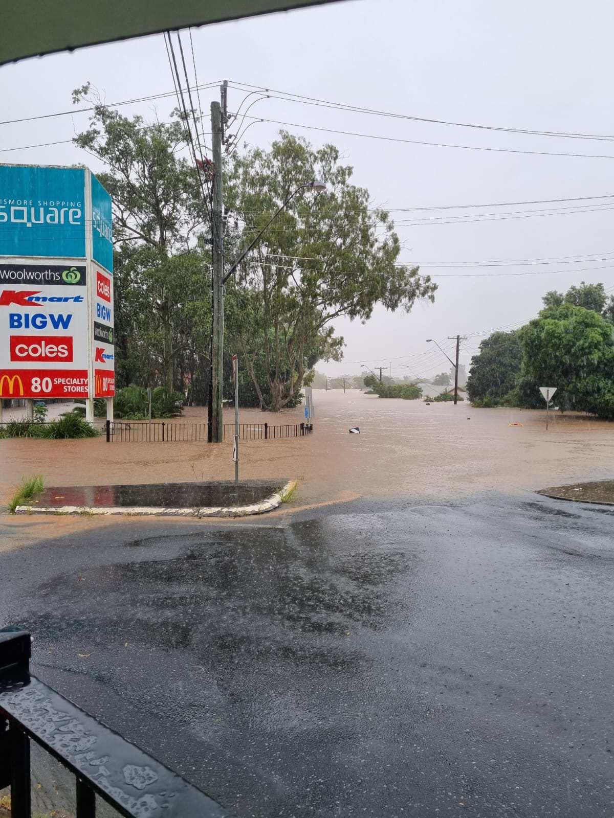 A view out to a flooded street.