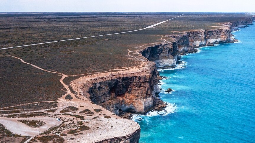A drone photo of the cliffs of the Great Australian Bight.