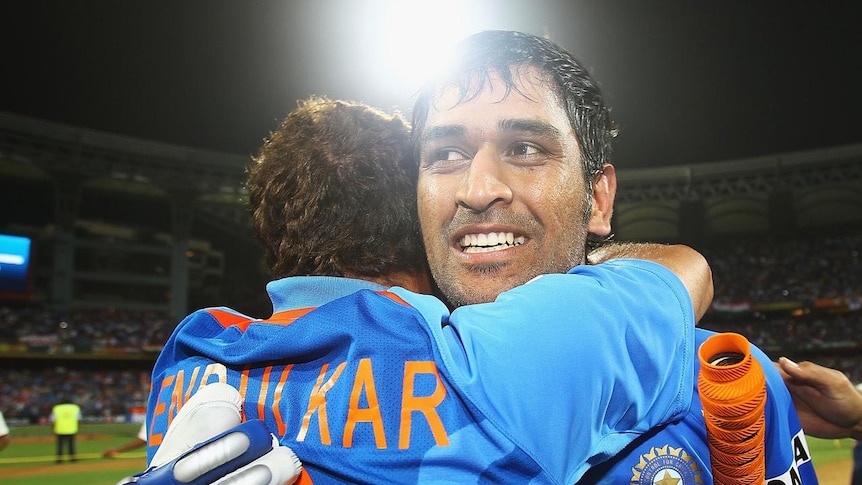 MS Dhoni is hugged by Sachin Tendulkar after India win the 2011 ICC World Cup final against Sri Lanka (Getty)