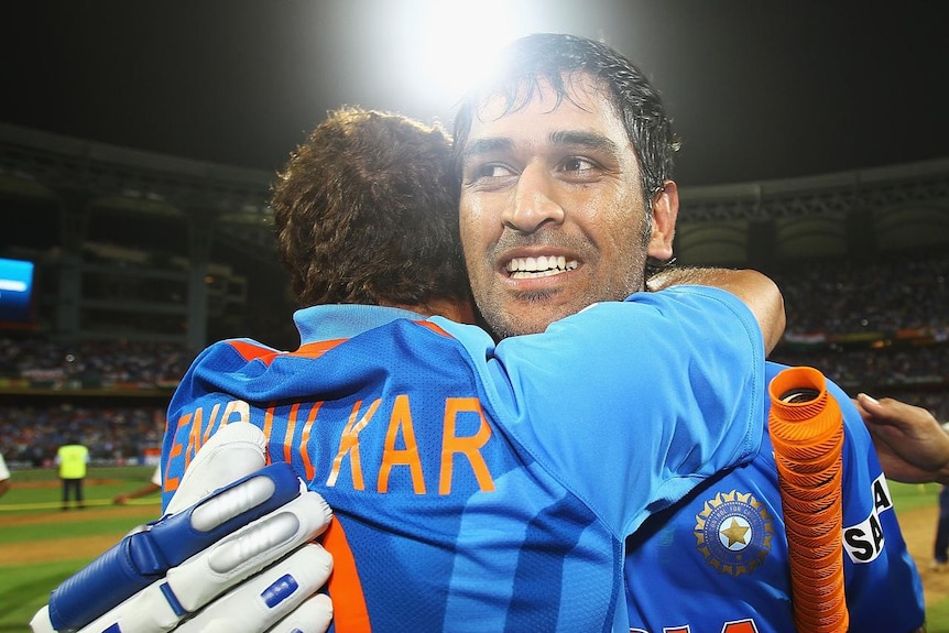 MS Dhoni is hugged by Sachin Tendulkar after India win the 2011 ICC World Cup final against Sri Lanka (Getty)