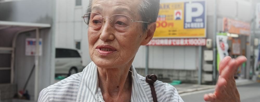 Tomiko Matsumoto at the site of her family home