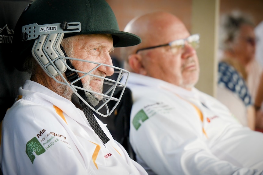 Veterans Cricket player in helmet