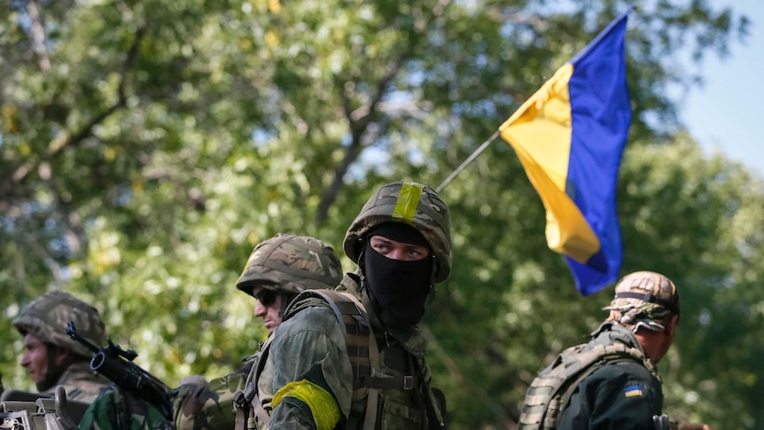 Ukrainian soldiers on an armoured vehicle near Kramatorsk