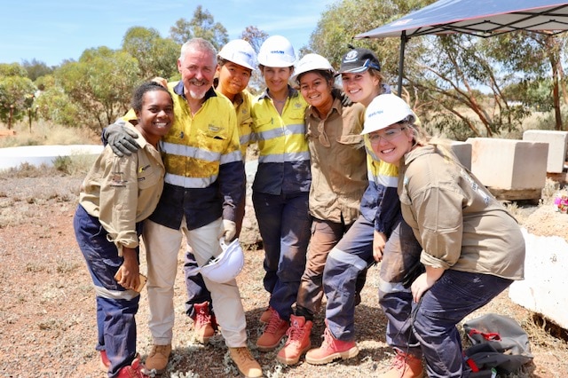 Jones with members of the WA School of Mines' Wombats mining team.