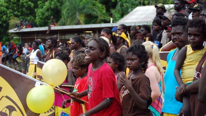 Fans say half the population of the Tiwi Islands came over for the game.