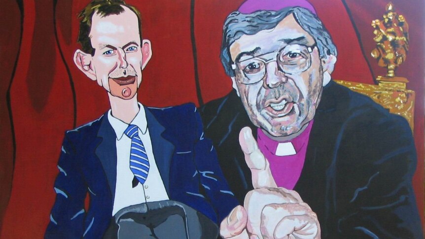 A painting of Cardinal George Pell with Tony Abbott seated on his lap, as if he is a ventriloquist with a doll.