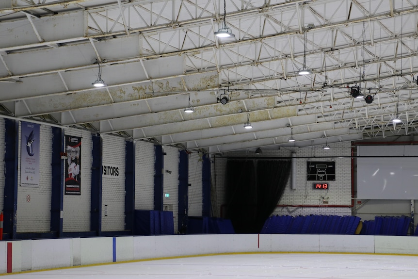 the inside of an ice rink no longer in operation
