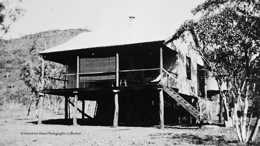 Black and white photo of a tin house in 1924.