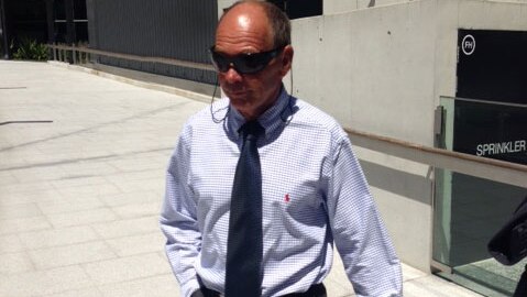 Gold Coast City Council senior lifeguard Stuart Keay outside the inquest into Matthew Barclay's death at 2012 Surf Life Saving Championships. Monday Dec 9, 2013