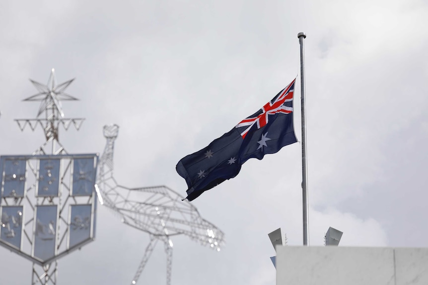Australian flag at half-mast.