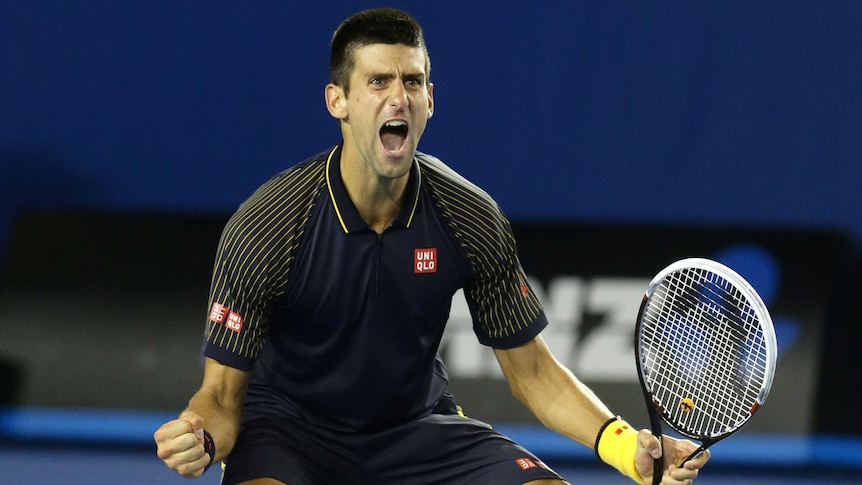 Djokovic celebrates winning match point