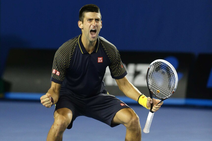 Djokovic celebrates winning match point
