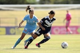 Kyra Cooney-Cross and Leah Davidson have their eyes on the ball in the W-League