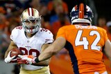 Jarryd Hayne eyes off the Denver Broncos defence in NFL preseason
