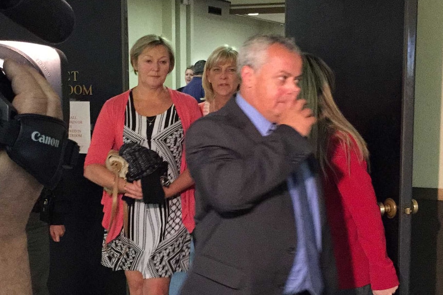 Chris Lane's parents leave the courtroom at Chancey Luna's trial