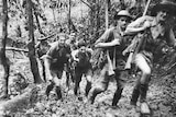 Arnold Forrester (second from left) on the Kokoda Track in WWII