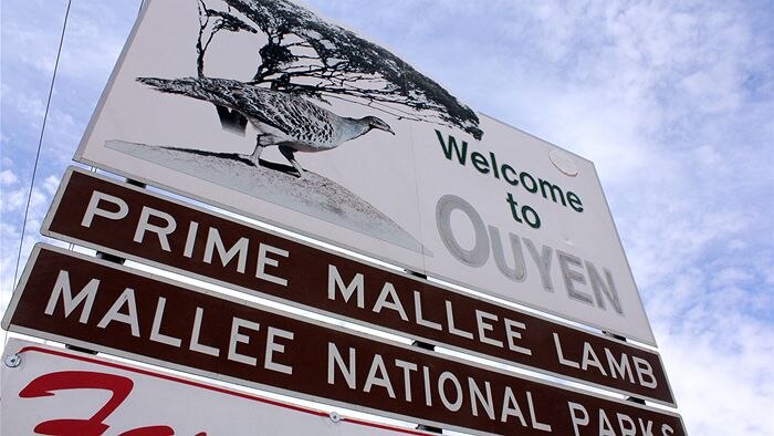 Sign saying Welcome to Ouyen, Prime Mallee Lam, Mallee National Parks, with a picture of a Mallee fowl.