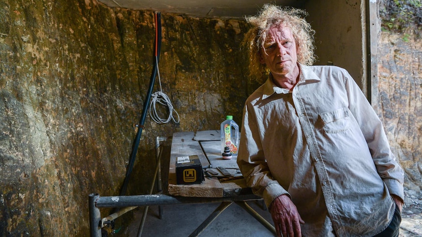 Lionel Buckett inside his fire bunker in the Blue Mountains in New South Wales.