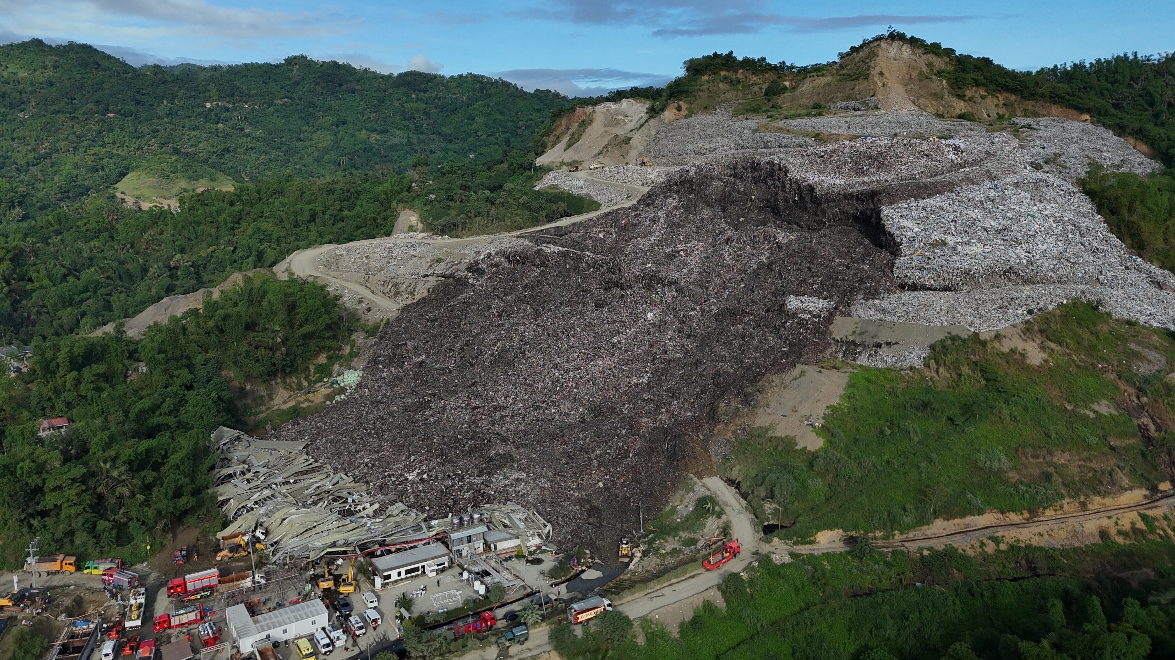 Philippines landfill collapse kills at least one person with dozens missing