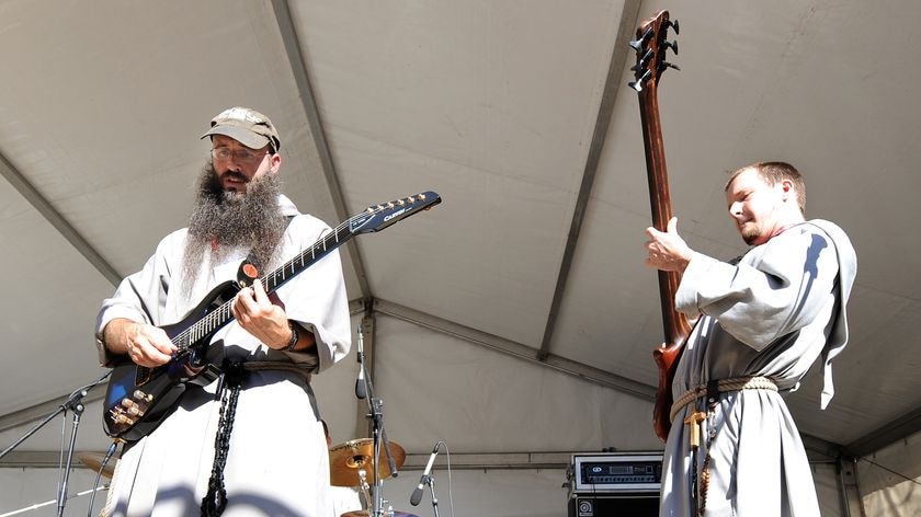 Franciscan Friars of the Renewal from New York perform for pilgrims.