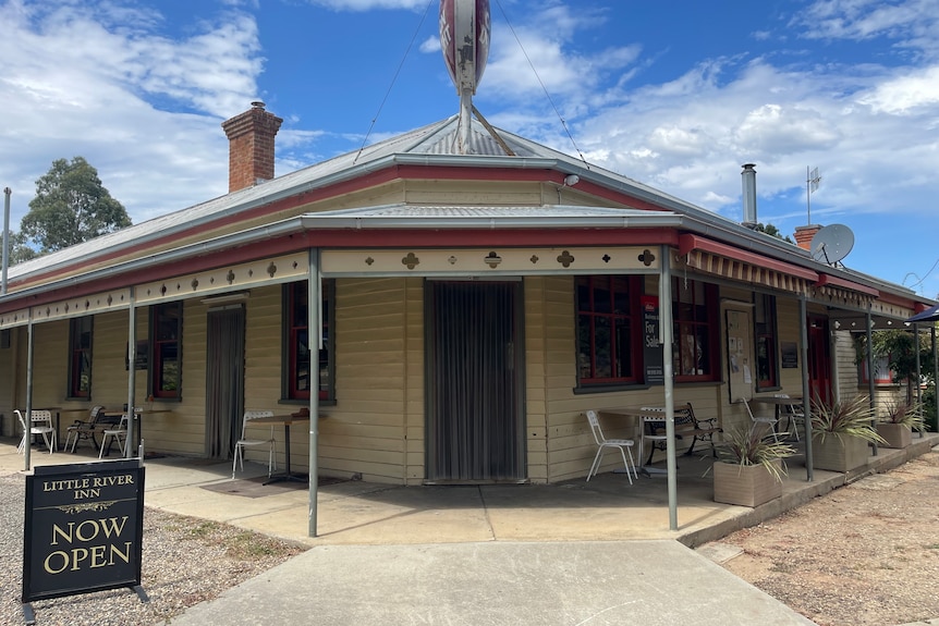 An exterior of an old weatherboard pub