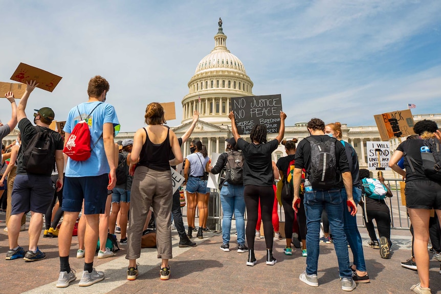 A group of protesters outside the United States Capitol building