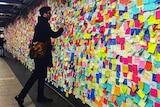 The walls of Union Square subway station are covered in post-it notes bearing messages of protest and support.