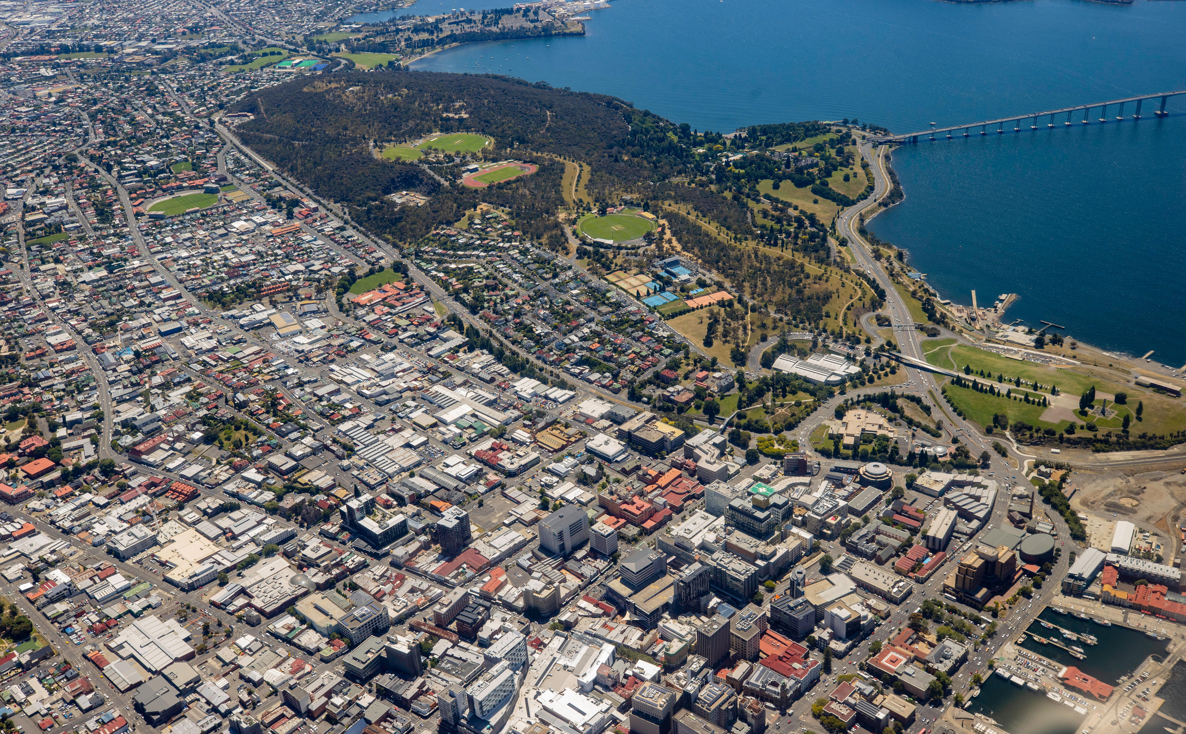 Hobart CBD buildings seen from a plane window.