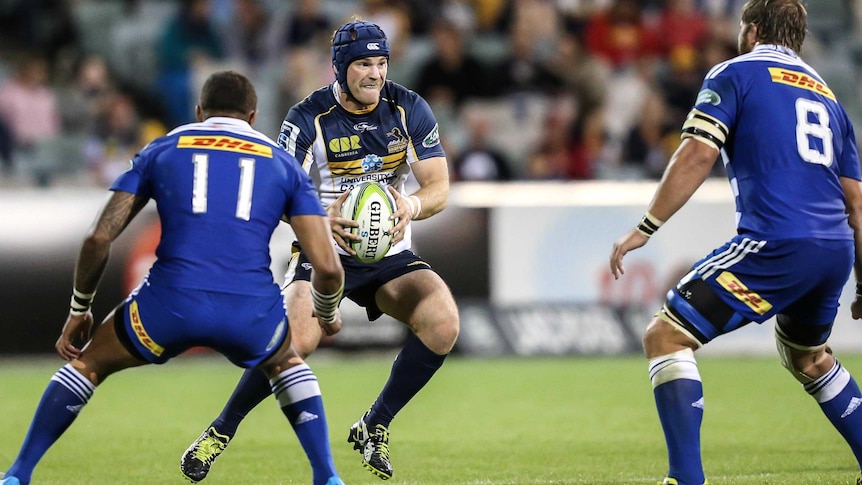 Brumbies centre Pat McCabe takes on the Stormers at Canberra Stadium