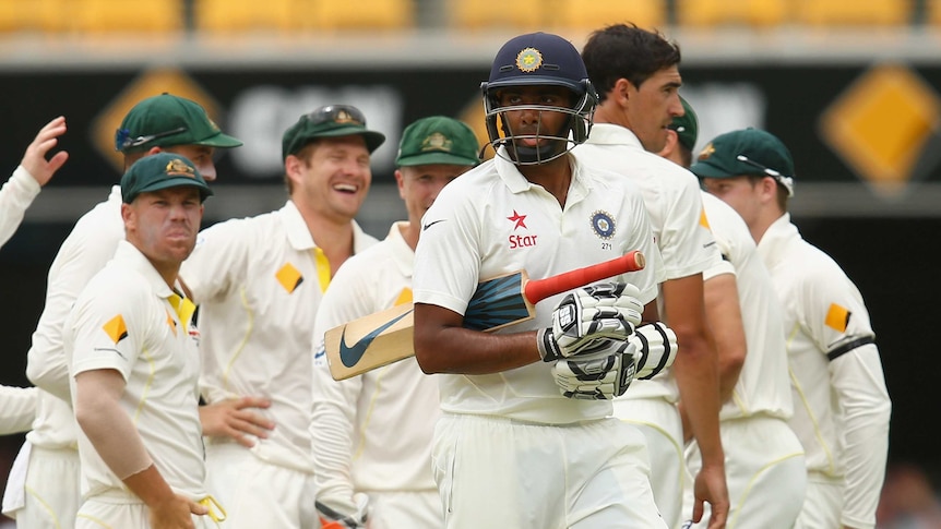 Australia celebrates the wicket of Ravichandran Ashwin