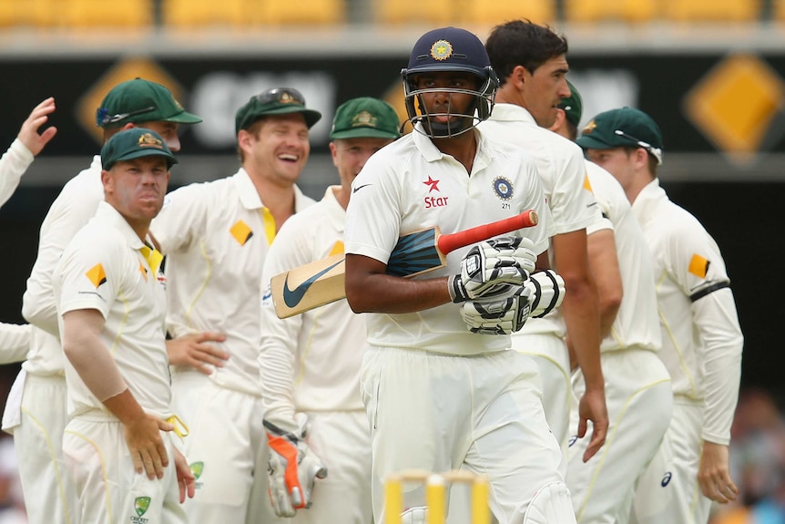 Australia celebrates the wicket of Ravichandran Ashwin