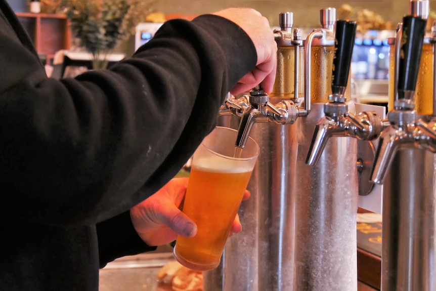 Fruit waste beer pouring