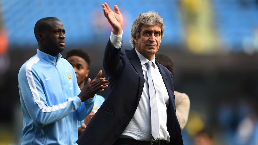 Manchester City manager Manuel Pellegrini acknowledges fans after Premier League draw with Arsenal.