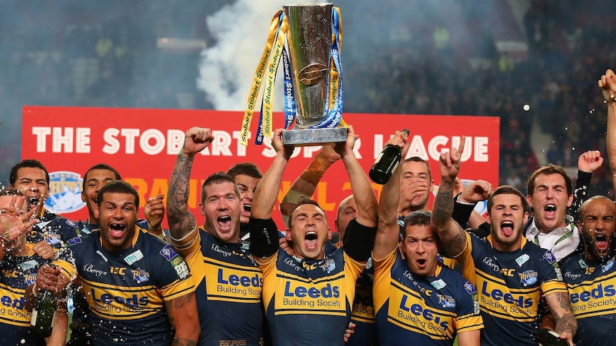 Kevin Sinfield gets his hands on yet another Super League title for Leeds.