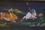 A colourful chalk drawing displays goblins mounted on rabbits as steeds galloping across a green meadow.