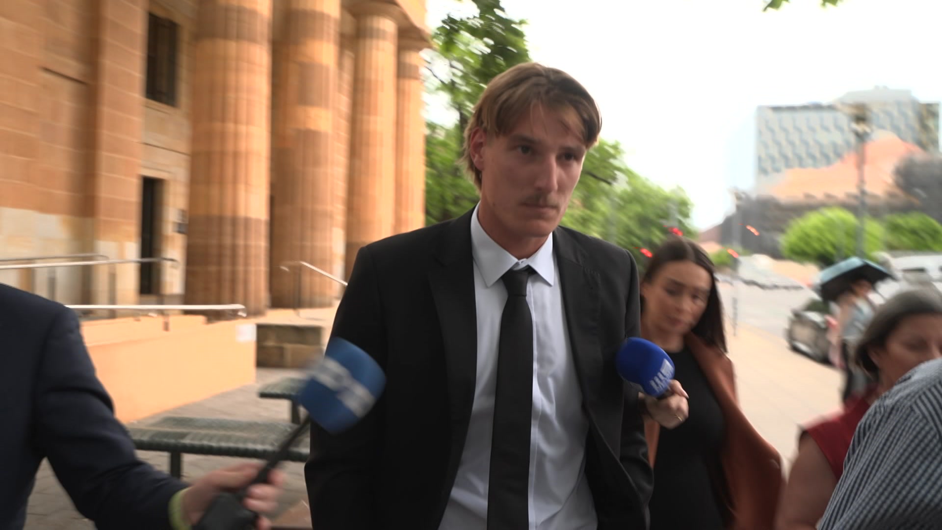 Adelaide Crows star avoids jail for running red light and hitting pedestrian