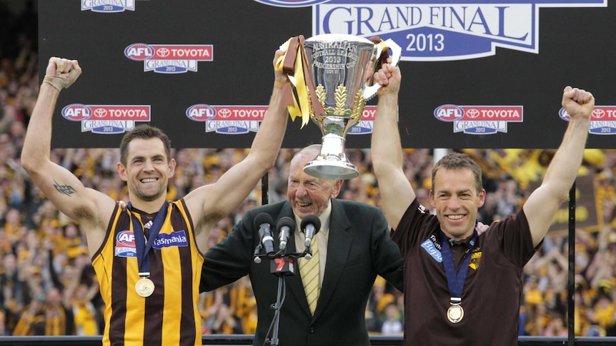Luke Hodge and Alistair Clarkson with the AFL premiership cup