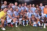 World All Stars team poses with Arthur Beetson Trophy after win over Indigenous All Stars.