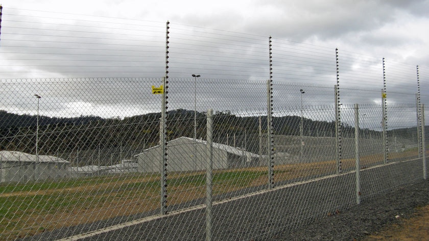 Tasmania's Risdon Prison behind a double fence