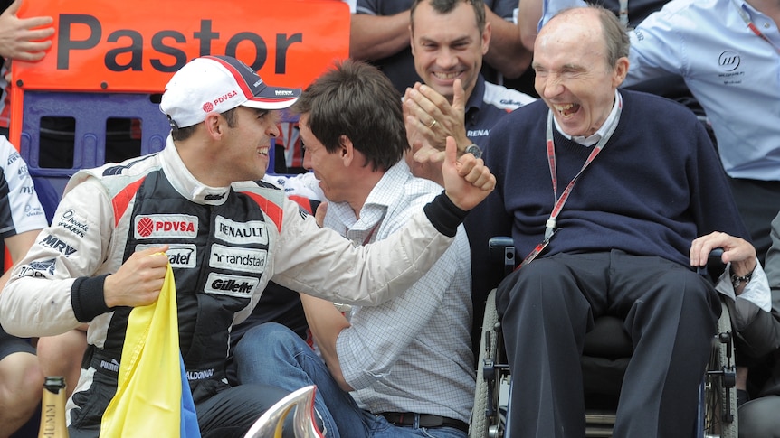 Rare win ... Venezuelan driver Pastor Maldonado celebrates with his Williams team-mates.