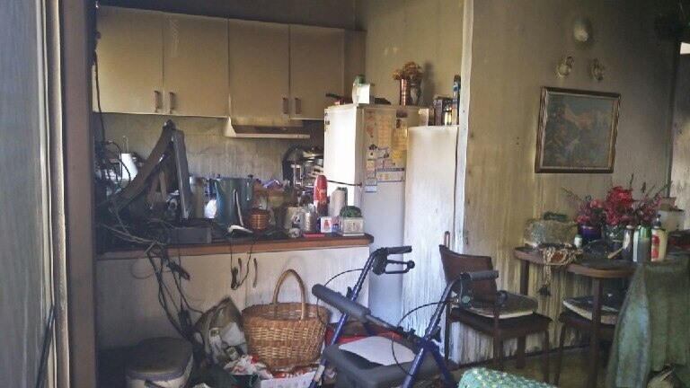 Kitchen of 89-year-old woman's fire-damaged unit at Redcliffe.