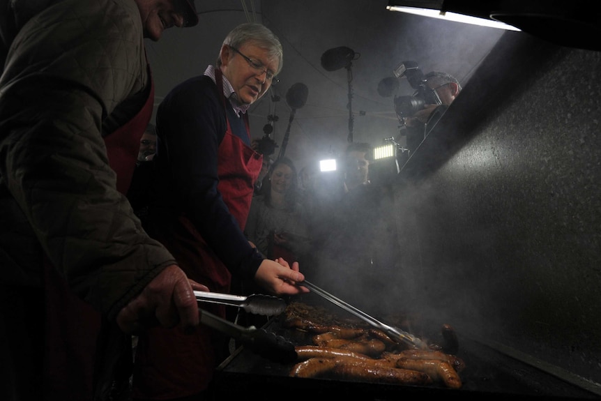 Prime Minister Kevin Rudd cooks a barbecue with Holden workers in Salisbury, near Adelaide.