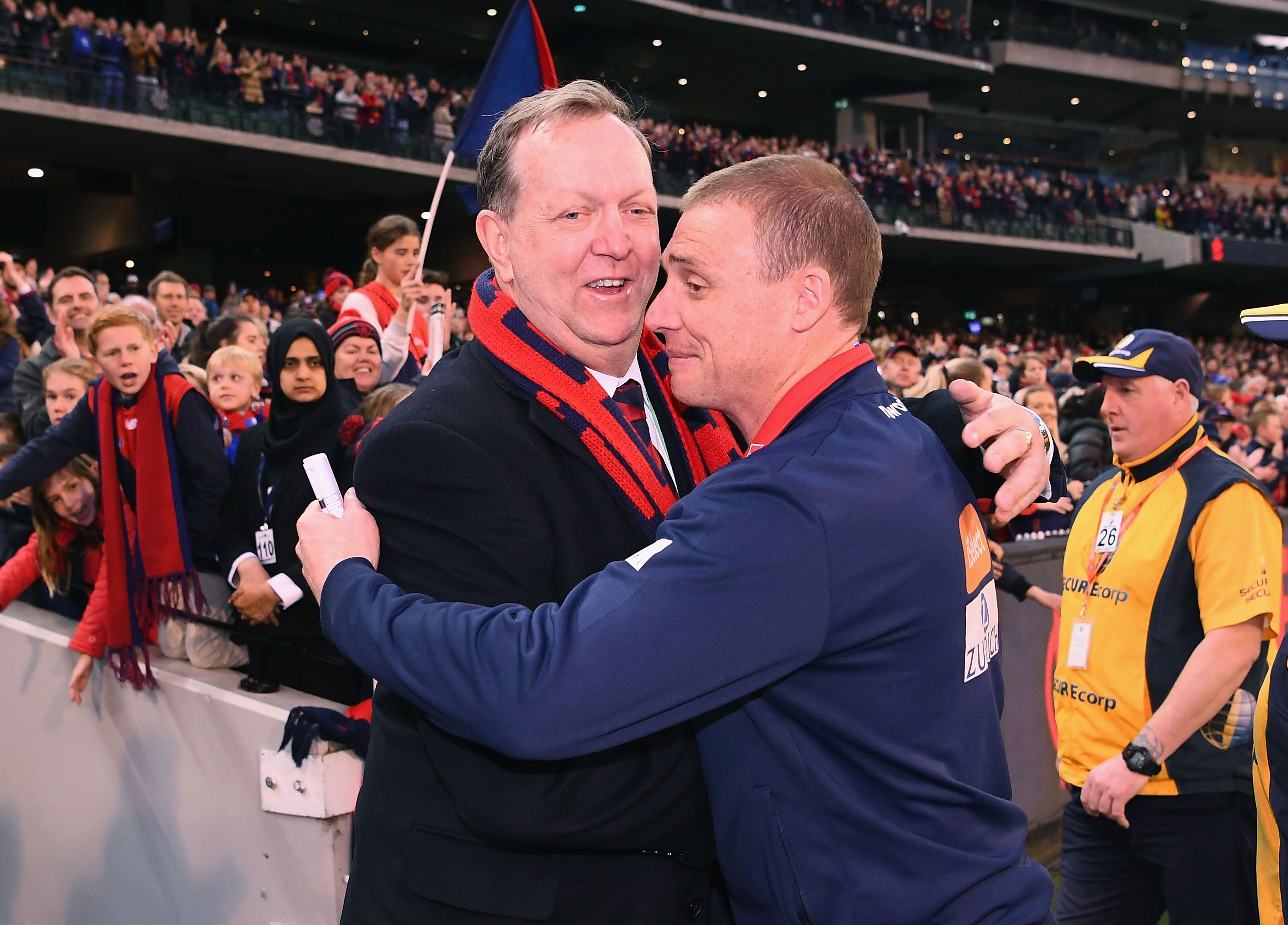 Glen Bartlett hugs Simon Goodwin