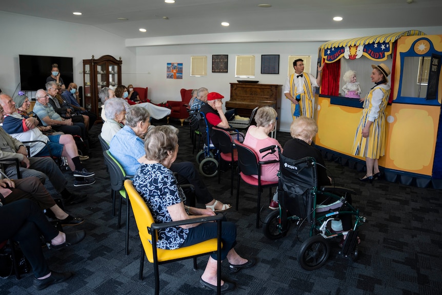 Lillian Martin Uniting AgeWell residents watching a puppet show.