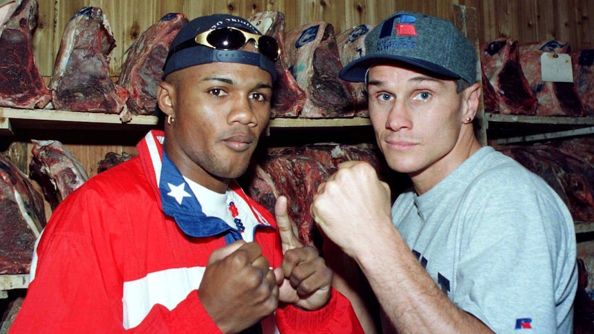 Felix Trinidad (L) poses with Troy Waters ahead of their 1997 bout.