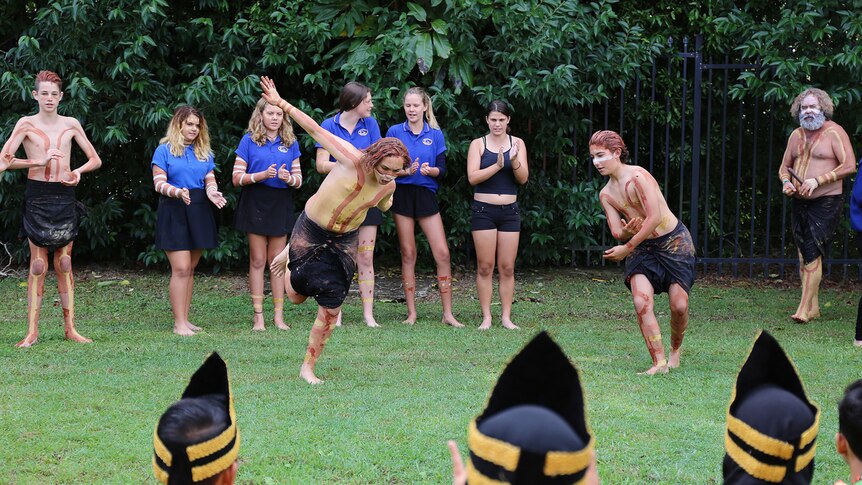 Indonesian students watching Aboriginal dancers